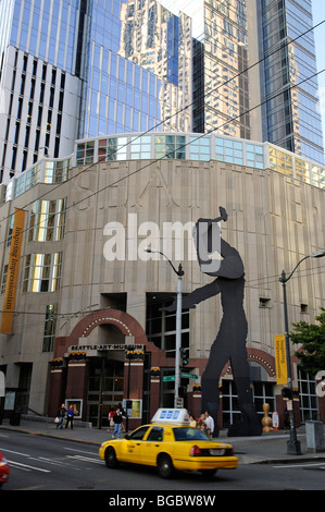 Hammering Man, and Yellow Cab, Downtown, Seattle, USA Stock Photo