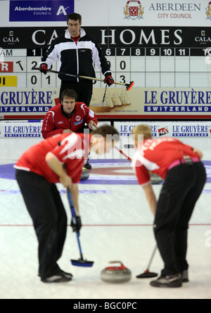 Curlers taking part in the European Curling Championships at the Linx Ice Arena in Aberdeen, Scotland, UK Stock Photo