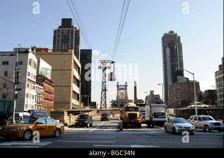 Traffic comes off the Queensborough Bridge Manhattan New York USA - Stock Photo