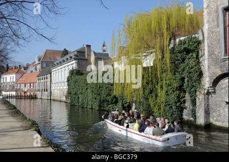 Sightseers on  canal boat, Bruge, Belgium Stock Photo