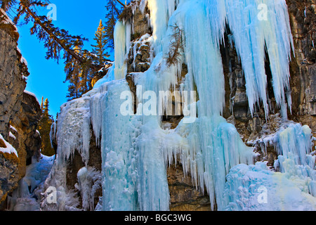 Ice formations on the walls of Johnston Canyon at the Upper Falls during winter, Banff National Park, Canadian Rocky Mountains,  Stock Photo