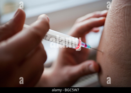 Application of an intramuscular injection Stock Photo