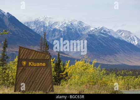 Entry sign of Kluane National Park and Reserve along Haines Road near Kathleen Lake, Indian Summer, leaves in fall colours, St. Stock Photo