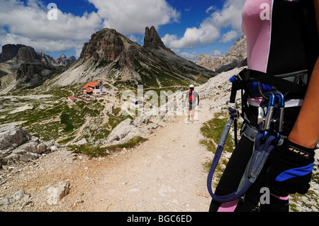 Climbers on fixed rope route onto Paterno, Sextnerstein, Alta Pusteria, Sexten Dolomites, South Tyrol, Italy, Europe Stock Photo