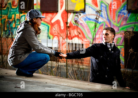 Couple at railway station Stock Photo