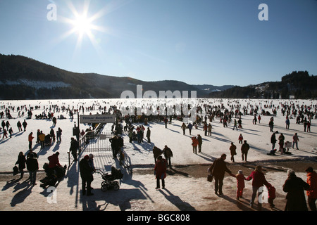 Crowds on the frozen Titisee lake in the Black Forest, Baden-Wuerttemberg, Germany, Europe Stock Photo