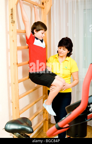 Physiotherapist and patient doing physiotherapy Stock Photo