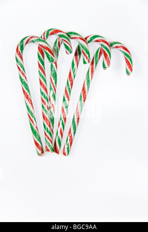 Five Red and Green Striped Christmas Candy Canes Isolated on a White Background Stock Photo