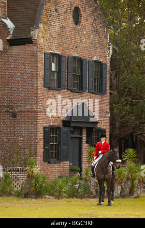 Mounted Fox Hunters on the greensward of the plantation house at Middleton Place plantation in Charleston, SC Stock Photo