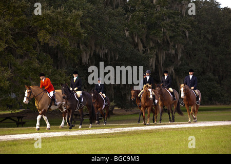 Mounted Fox Hunters gather on the greensward of the plantation house at Middleton Place plantation in Charleston, SC Stock Photo