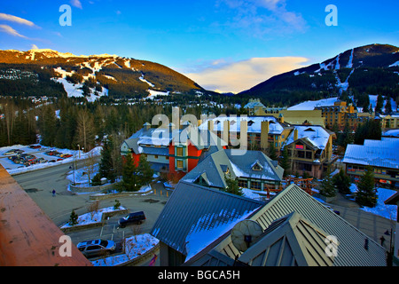 Blackcomb (2440 metres/8000 feet) and Whistler Mountains (2182 metres/7160 feet) seen from the Pan Pacific Hotel in Whistler Vil Stock Photo