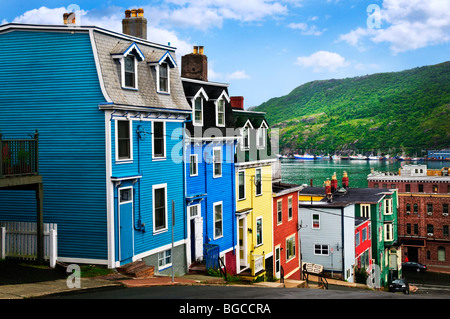 Street with colorful houses near ocean in St. John's, Newfoundland, Canada Stock Photo