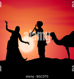 silhouette view of people performing folk dance and music, india  Stock Photo