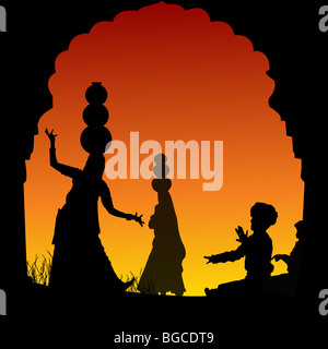 silhouette view of people performing folk dance and music, india Stock Photo