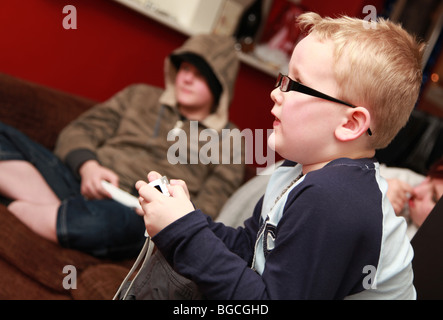 Kids playing on the Wii Stock Photo