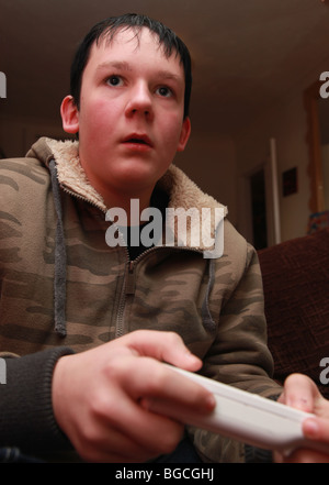 Teenage boy playing Wii Stock Photo