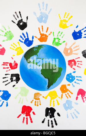 Multicoloured children's hand prints around the world Stock Photo