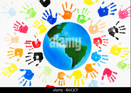 Multicoloured painted children's hand prints around the world Stock Photo