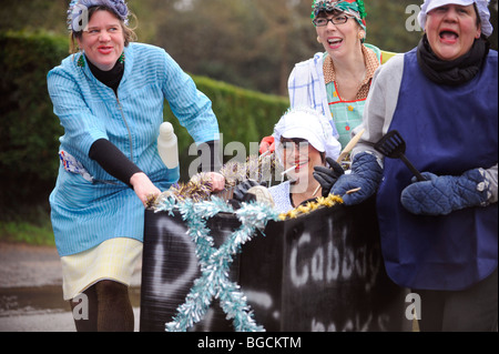 Villagers compete in their annual Boxing Day pram race event. East Hoathly near Lewes, UK. Picture Jim Holden. Stock Photo