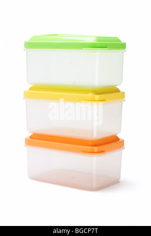 Stack of three plastic storage containers on white background Stock Photo