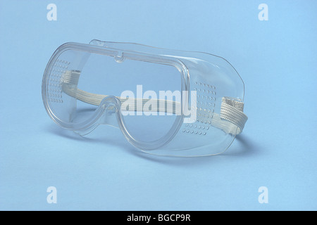 Safety goggles on seamless blue background Stock Photo
