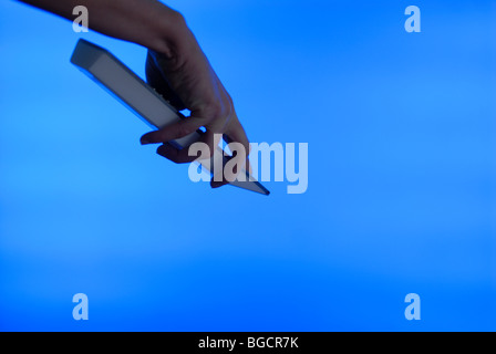 ADJUSTING FLAT SCREEN TV Stock Photo