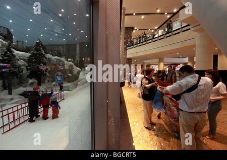 People in the indoor ski hall in the Mall of Dubai, United Arab Emirates Stock Photo