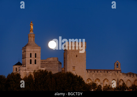 Full Moon Rising over the Palais des Papes, or Popes Palace, & Cathedral Notre-Dame-des-Doms, Avignon, Provence, France Stock Photo