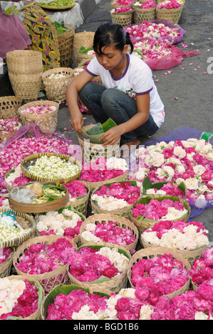 Flower seller in front of weekly market in Jogyakarta, Central Java, Indonesia, Southeast Asia, Asia