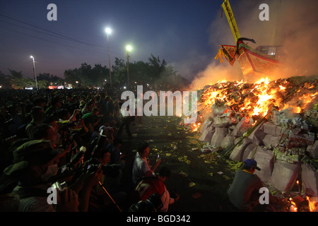 wood boat burning for a taiwanese festival Stock Photo