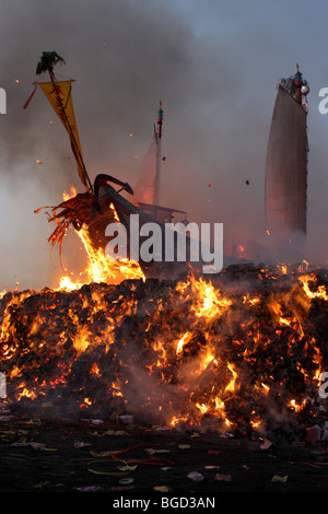 wood boat burning for a taiwanese festival Stock Photo