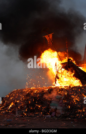 wood boat burning for a taiwanese festival Stock Photo