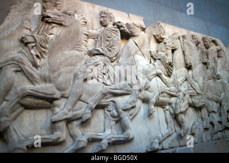 Details of the frieze from the interior of the Parthenon known as the Elgin Marbles on display at the British Museum in London Stock Photo