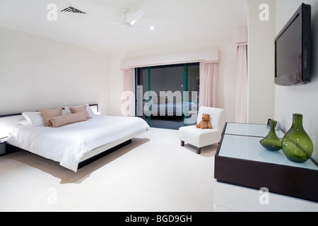 Master bedroom in luxury mansion Stock Photo