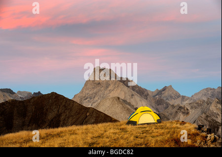 Tent on plateau in front of Alp summits with a full moon, Kaisers, Lechtal, Ausserfern, Tyrol, Austria, Europe Stock Photo