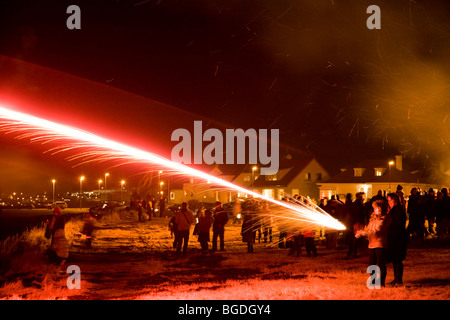 People celebrating new years eve. Aegissida, Reykjavik, Iceland. Stock Photo