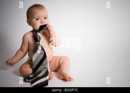 Baby wearing tie Stock Photo