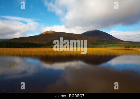 Scotland Isle of Skye Loch Cill Chriosd looking across to Beinn Dearg Bheag 582mtr Beinn Dearg Mhor 709mts and Beinn na Caillich Stock Photo