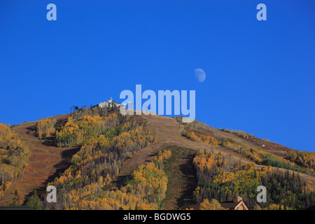 Moon over the Steamboat ski area in Steamboat Springs Colorado USA Stock Photo