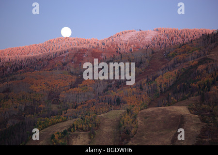 Moon over the Steamboat ski area in Steamboat Springs Colorado USA Stock Photo