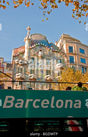 Barcelona tour bus at Antoni Gaudi's Casa Batllo Stock Photo