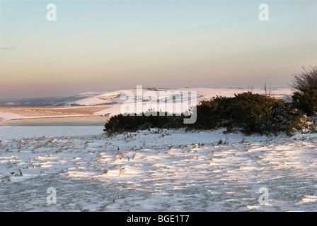 Snow comes to the South Downs National Park and the ancient iron age hill fort of Cissbury Ring. Stock Photo