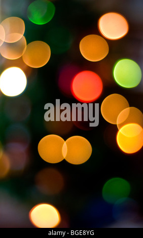 Bokeh created by blurred Christmas tree lights Stock Photo