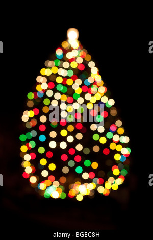 Out of focus colored lights on a christmas tree in Birmingham, England, UK Stock Photo