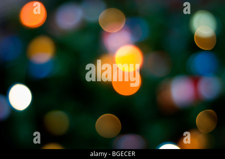 Bokeh created by blurred Christmas tree lights Stock Photo