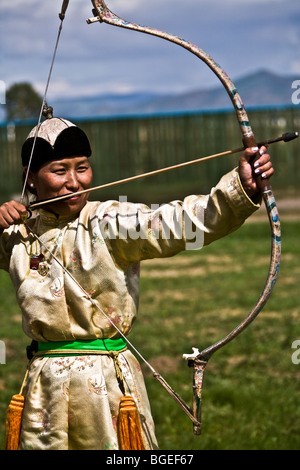 Men and women alike take part in the archery competition during the annual Naadam Festival Ulaan Baatar Mongolia Asia Stock Photo