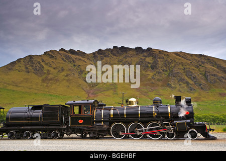 Kingston Flyer, a steam train built in 1925, at the Fairlight Station in Central Otago, South Island, New Zealand. Stock Photo