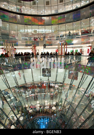 Interior view of spectacular glass walled atrium of Galleries Lafayette on Friedrichstrasse in Mitte Berlin Germany Stock Photo