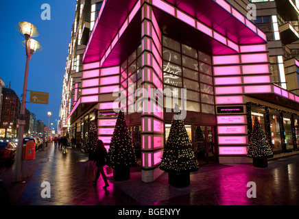 Evening view of exterior of Quartier 206 upmarket shopping mall on Friedrichstrasse in Mitte Berlin 2009 Stock Photo