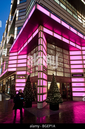 Evening view of exterior of Quartier 206 upmarket shopping mall on Friedrichstrasse in Mitte Berlin 2009 Stock Photo